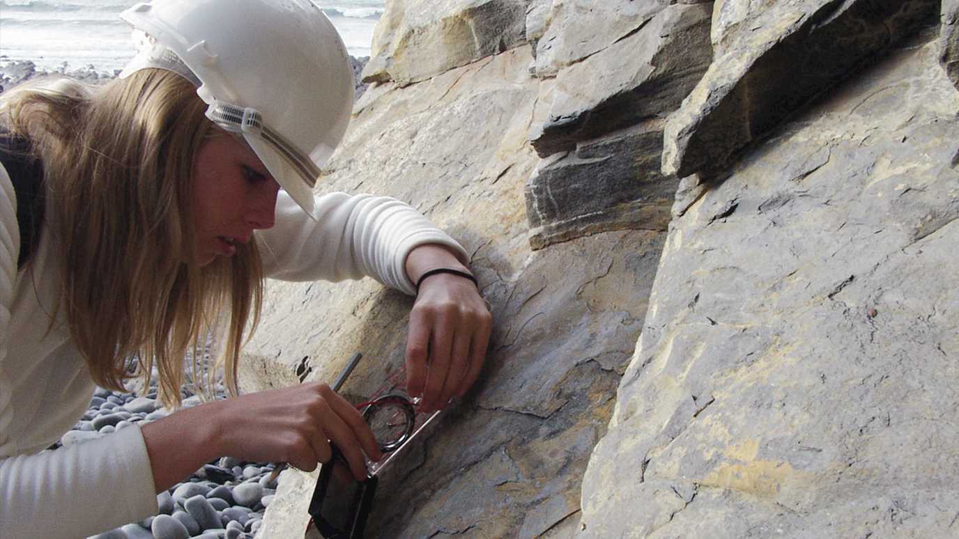 Fieldtrip, compass, rock, geology, outcrop, hard hat, girl - Earth Science